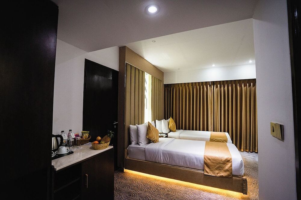 Unique Regency Hotel Dhaka Deluxe Twin Room 3