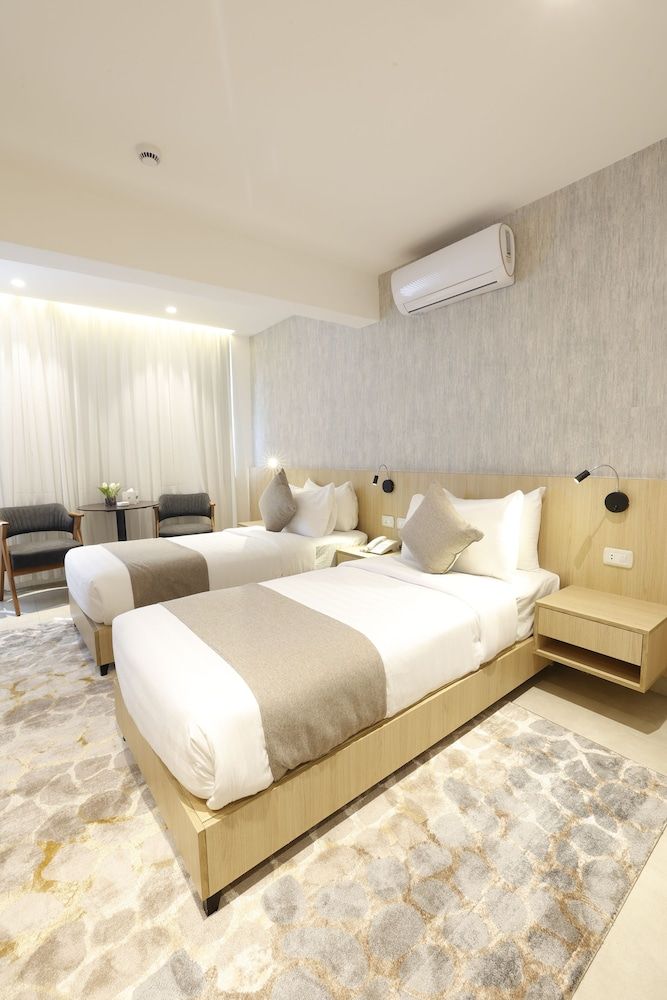 G Hotel Deluxe Twin Room