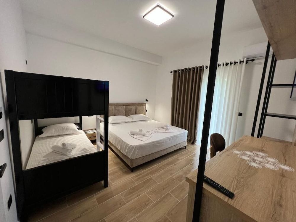 Green Garden Villa Quadruple Room, Garden View 11