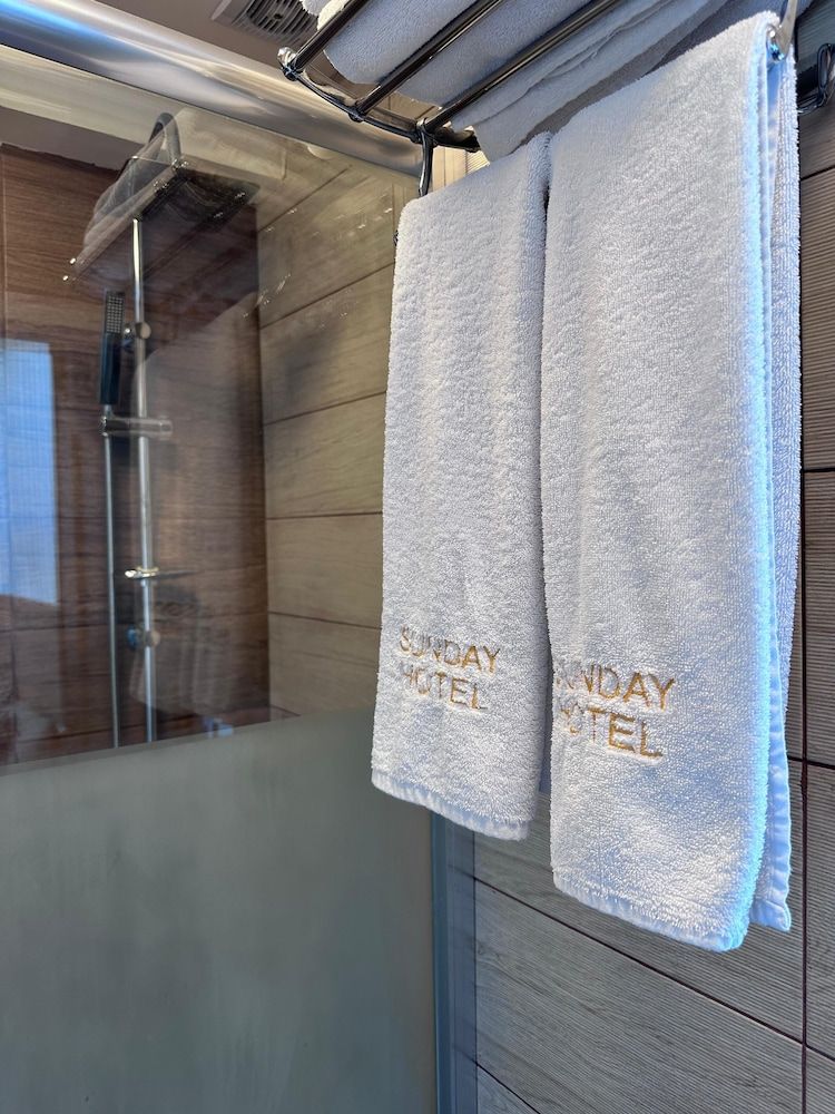 Sunday Hotel Deluxe Triple Room, City View 7