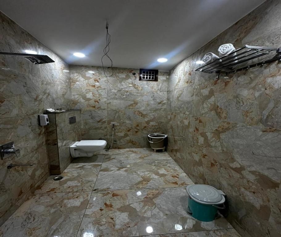 Minta Hotel & Banquet Deluxe Room 8