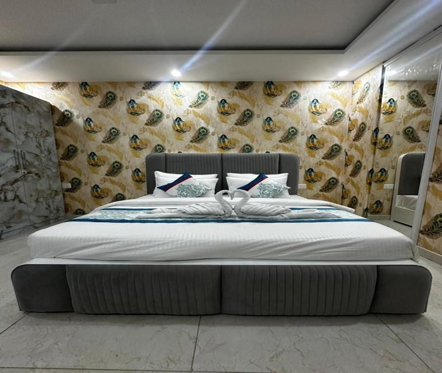 Minta Hotel & Banquet Deluxe Room 6