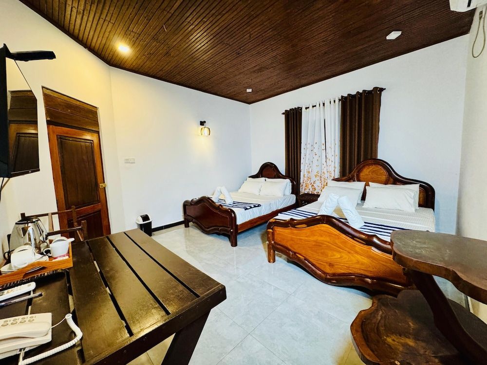 Stone Carving Resort Family Room, Balcony, Garden View 3