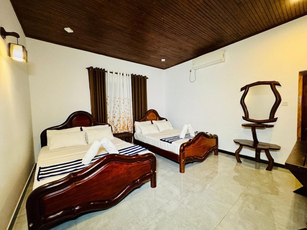 Stone Carving Resort Family Room, Balcony, Garden View