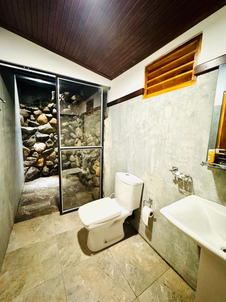 Stone Carving Resort Family Room, Balcony, Garden View 5