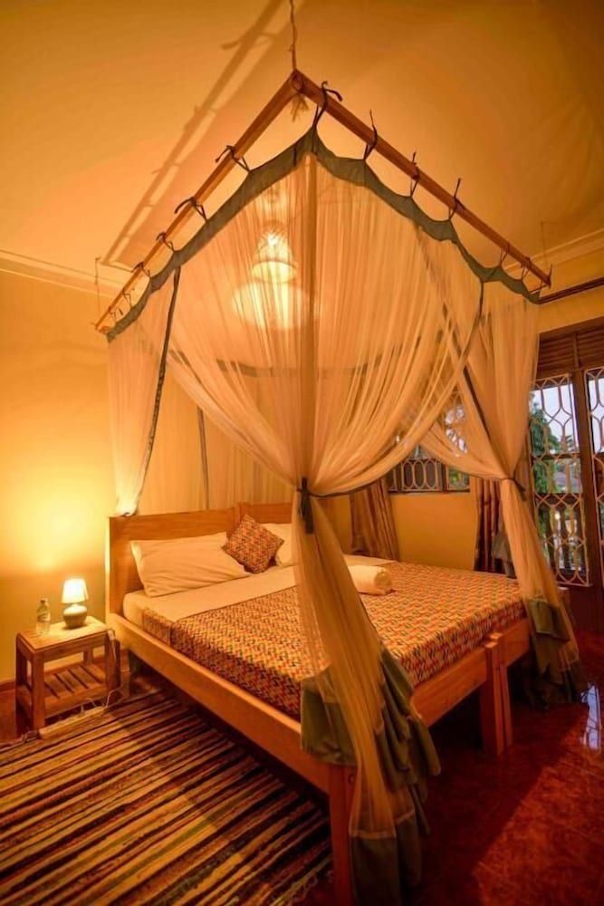 Cycad Entebbe Guest House Standard Room, 1 King Bed, Non Smoking, Garden View 4