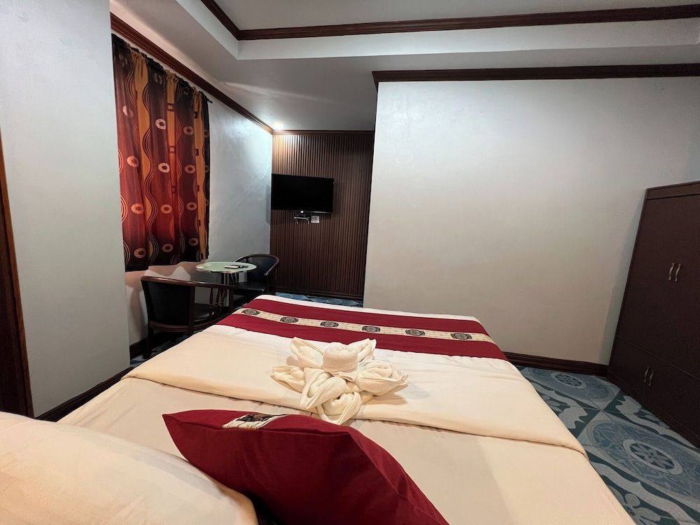 Rossa Hotel Deluxe Room 4