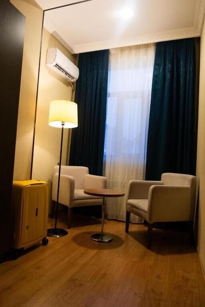 Grand Mirror Hotel Family Room, City View 10