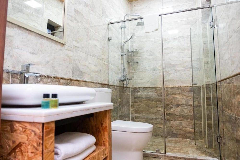 Grand Mirror Hotel Family Room, City View 4