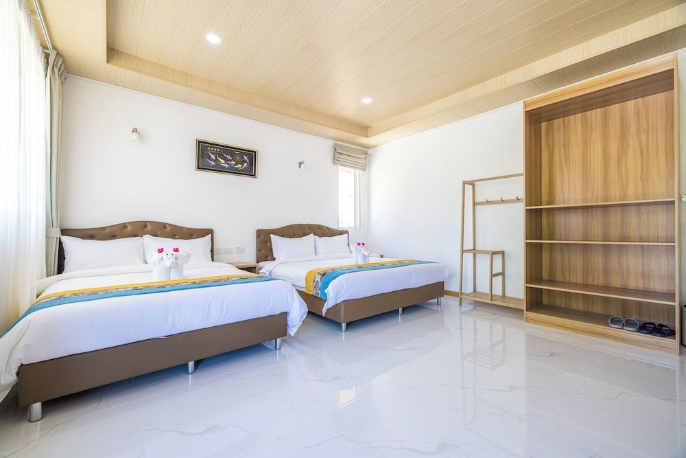 Tongtong Garden Holiday Hotel Family Triple Room, Balcony, Resort View 3