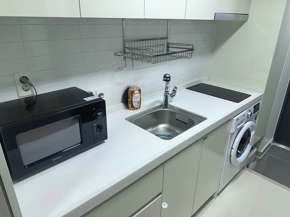 Grape Residence Hotel Deluxe Triple Room, Ocean View 2