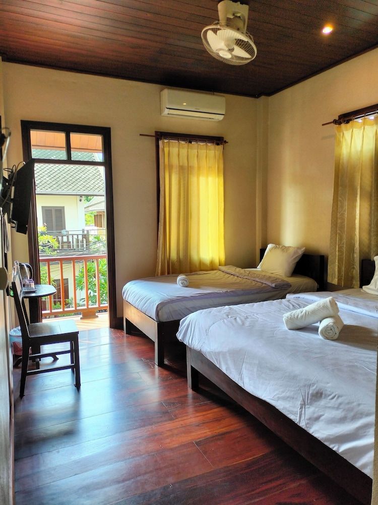 Tingkham Guesthouse Deluxe Triple Room, 2 Bedrooms