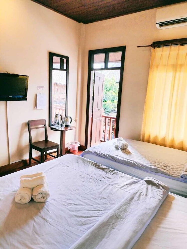 Tingkham Guesthouse Deluxe Triple Room, 2 Bedrooms 15
