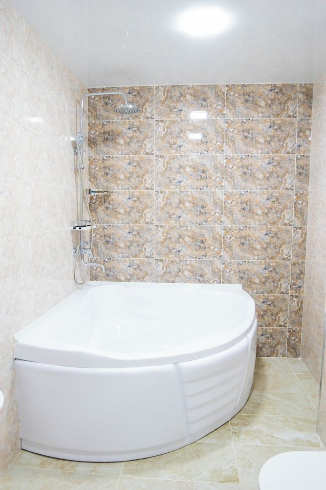 AirPlaza Hotel Family Quadruple Room, Balcony, Garden View 3