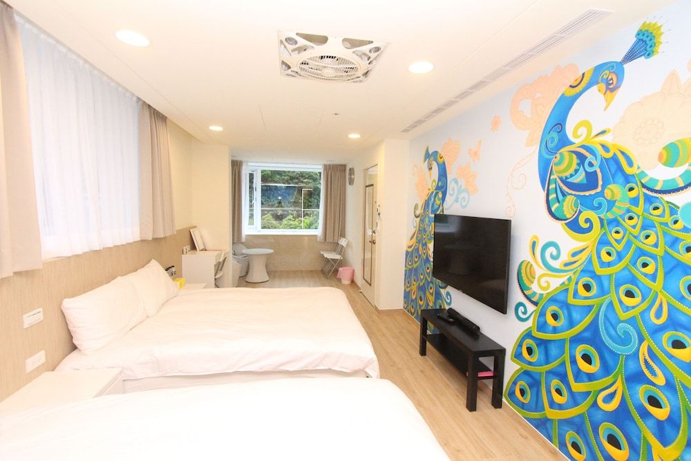 Ruifang Go Design Quadruple Room 3