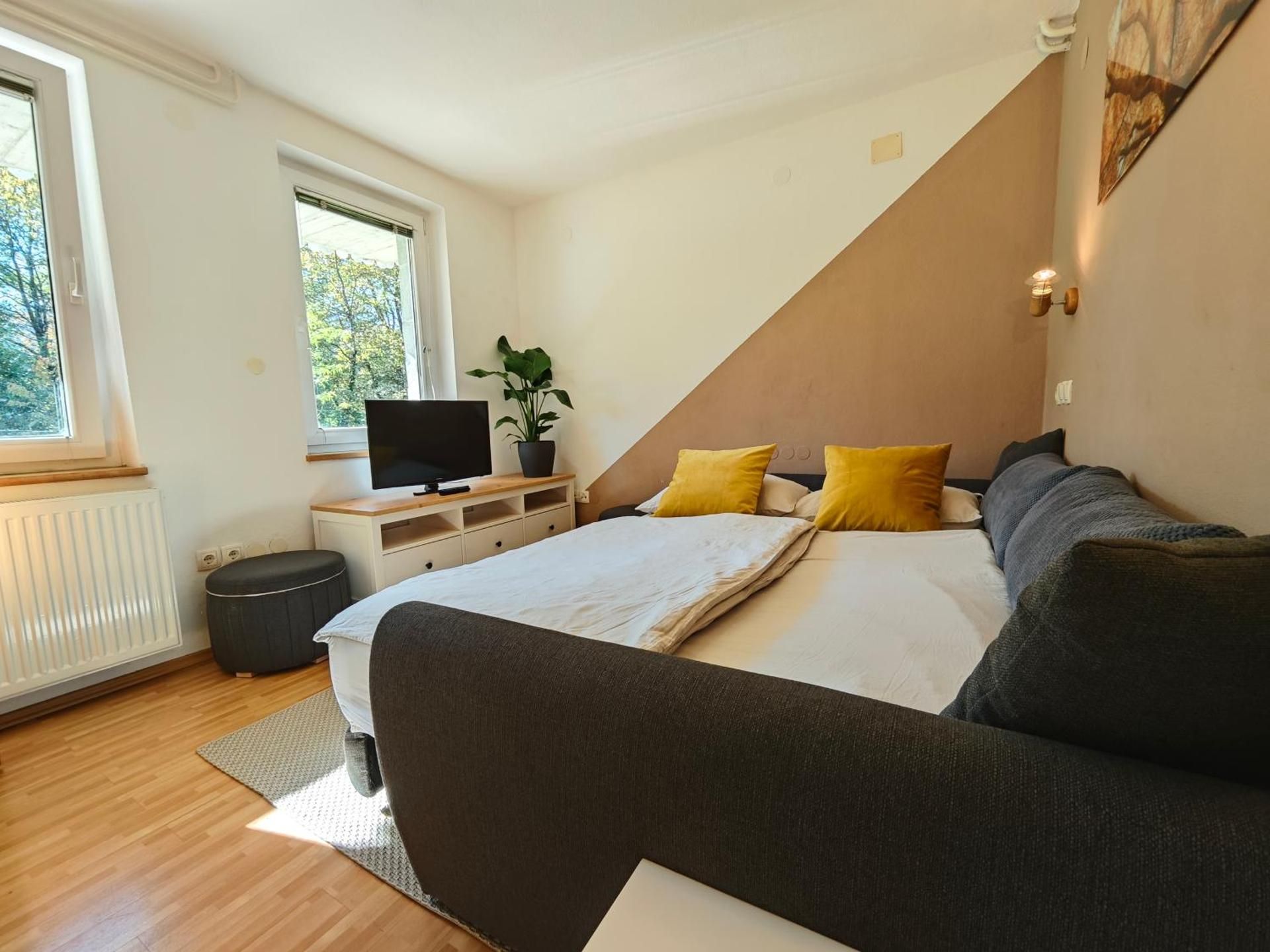 Three-Bedroom Apartment with Terrace and Lake View