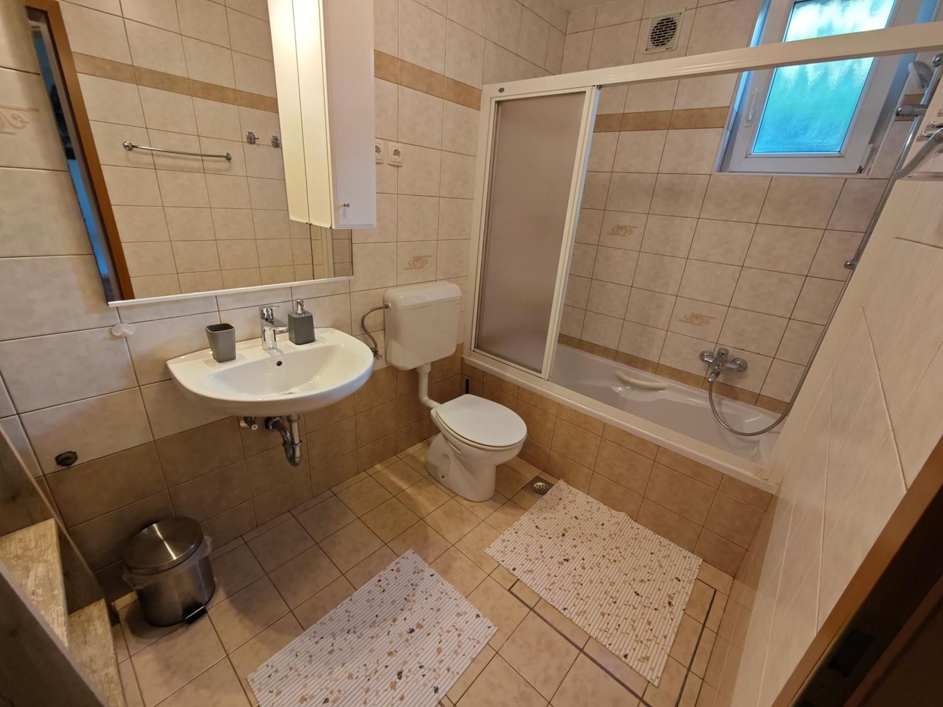 Three-Bedroom Apartment with Terrace and Lake View