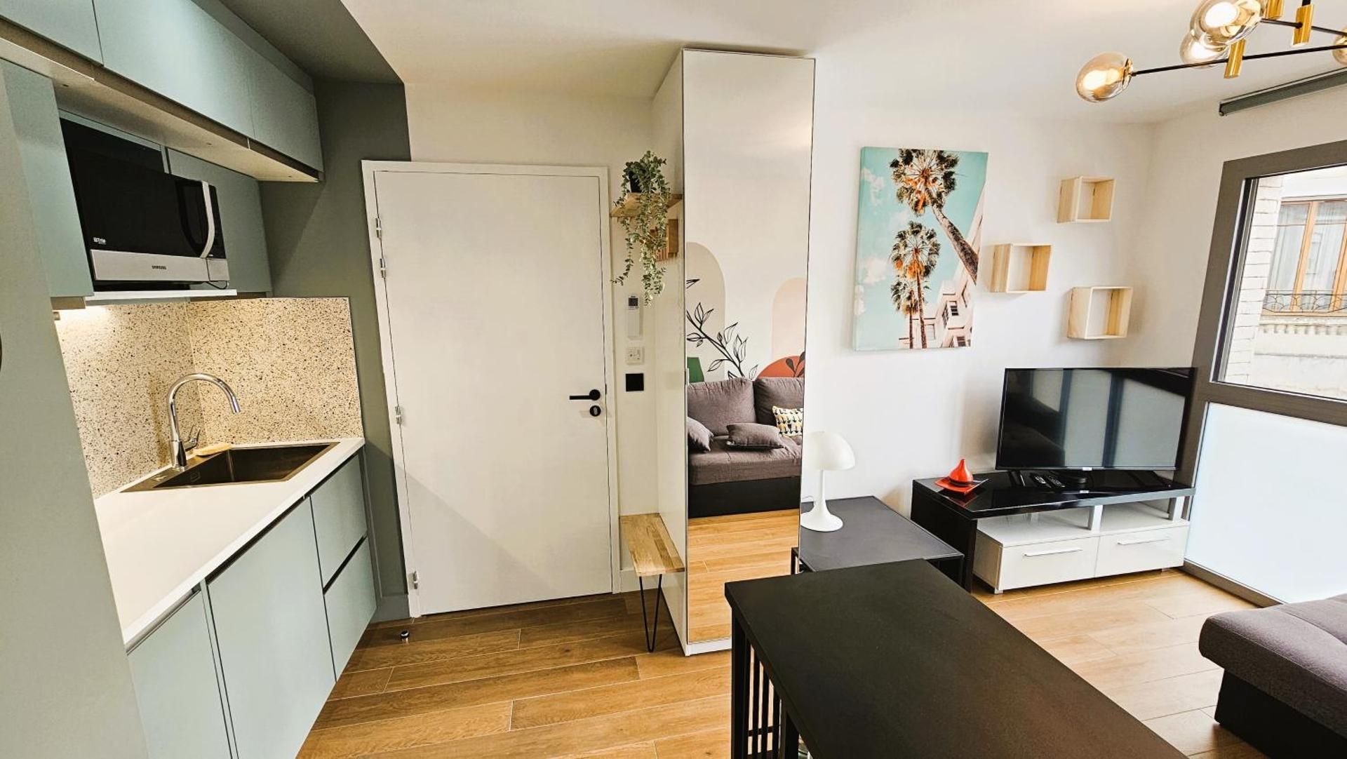 One-Bedroom Apartment with Balcony and City View