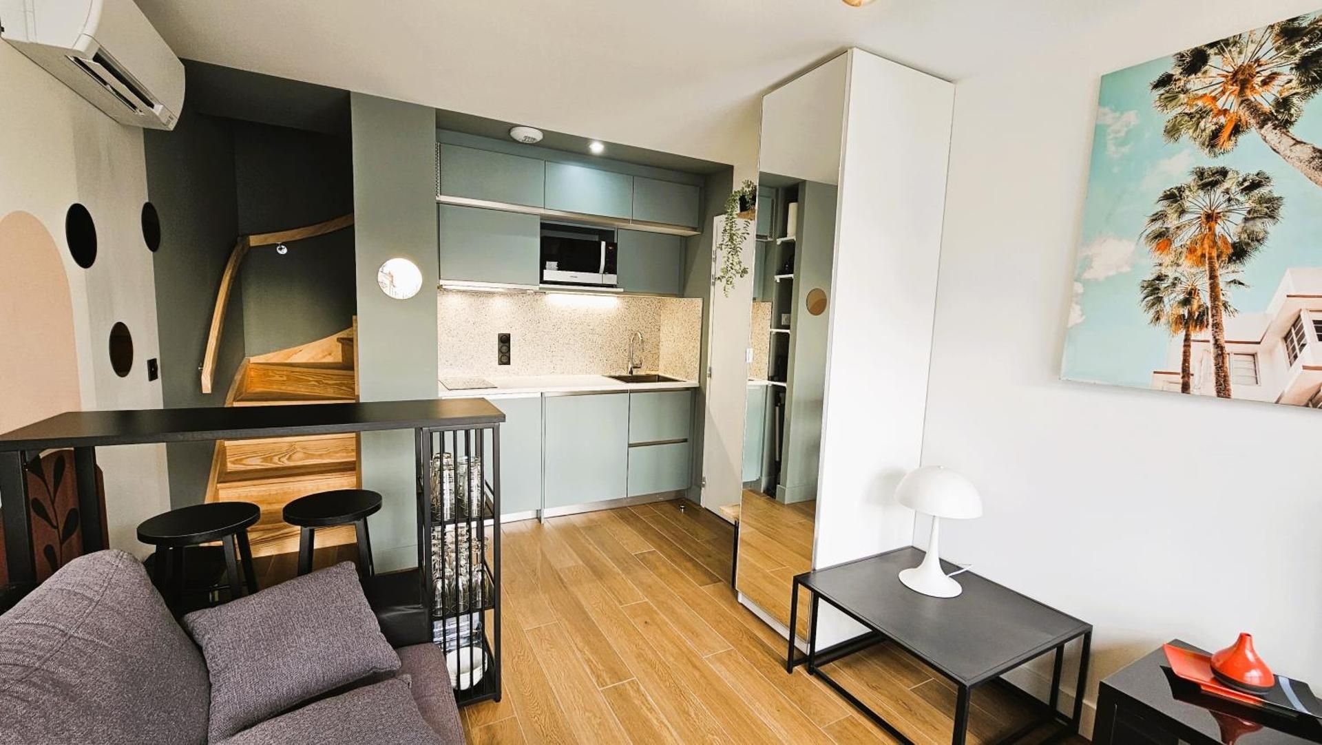 One-Bedroom Apartment with Balcony and City View