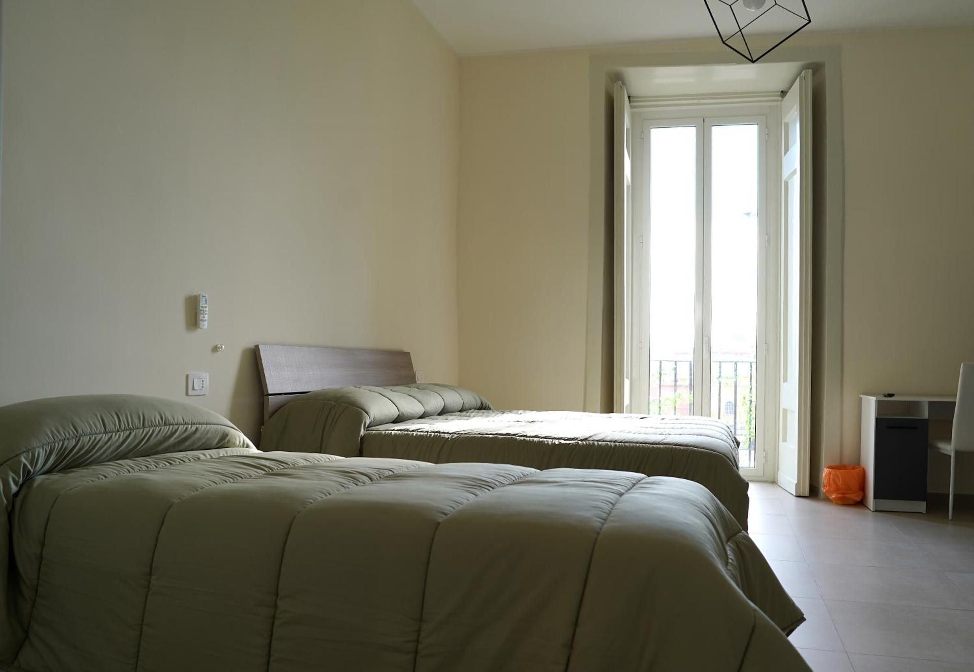 Quadruple Room with Private Bathroom