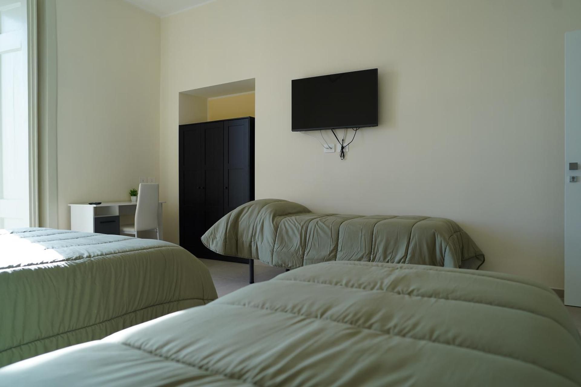 Quadruple Room with Private Bathroom