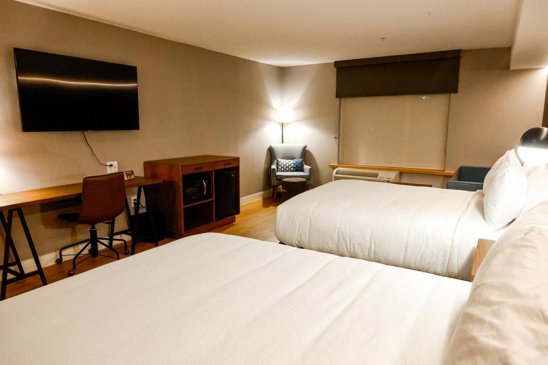 Four Points by Sheraton Austin Airport Superior Queen Room with Two Queens and One Sofa Bed