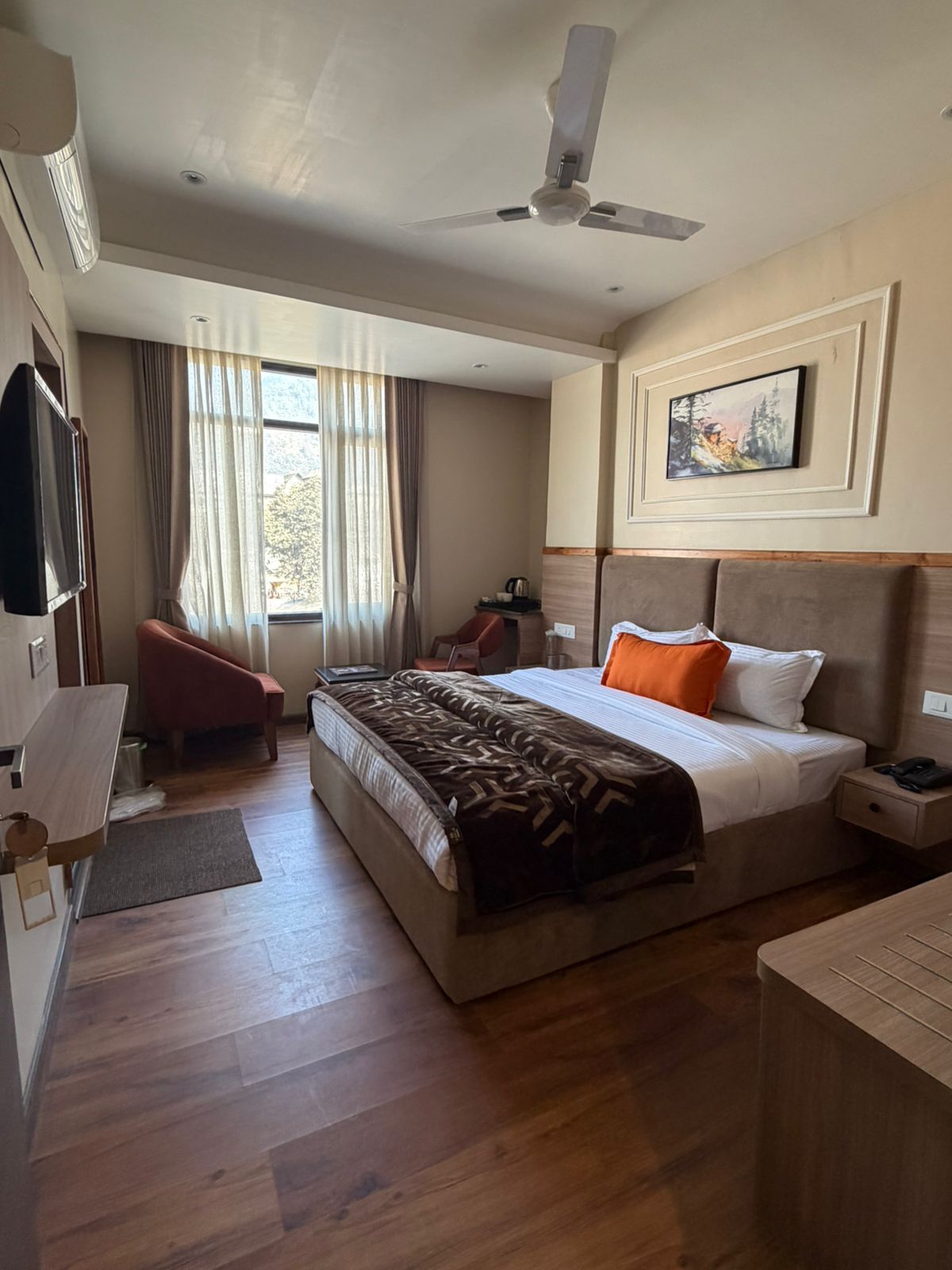 King Bed Room with City Hill View