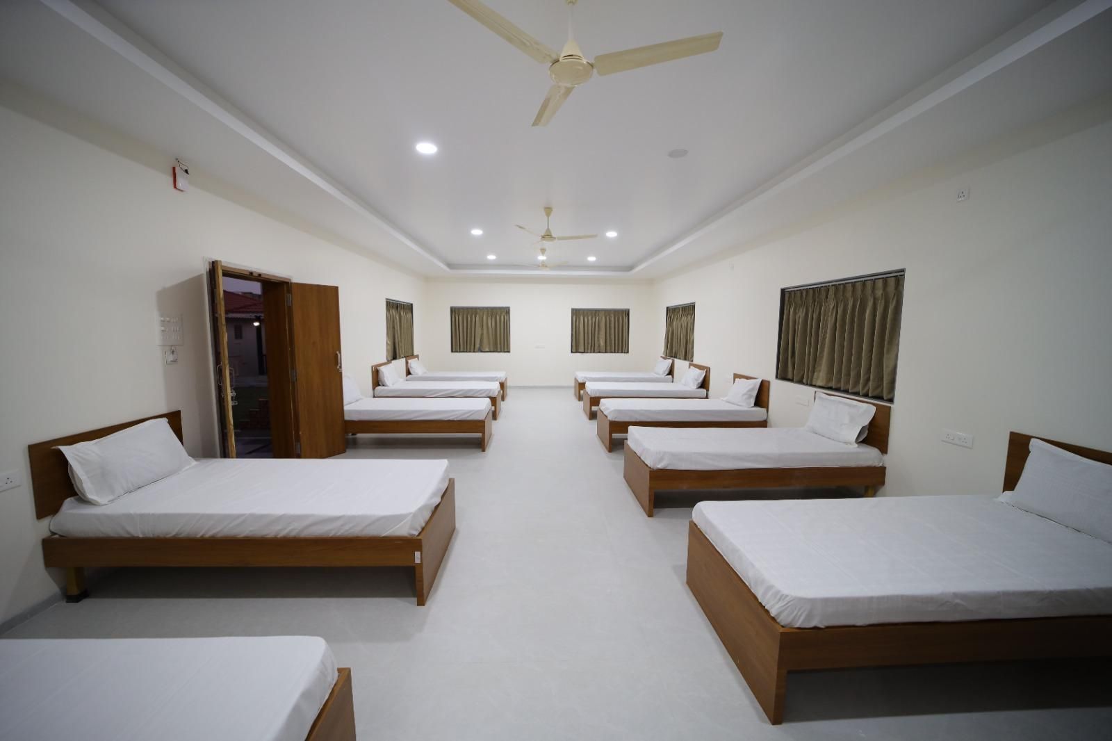Hotel Shivjanmabhumi Resort Bed in 10-Bed Mixed Dormitory Room