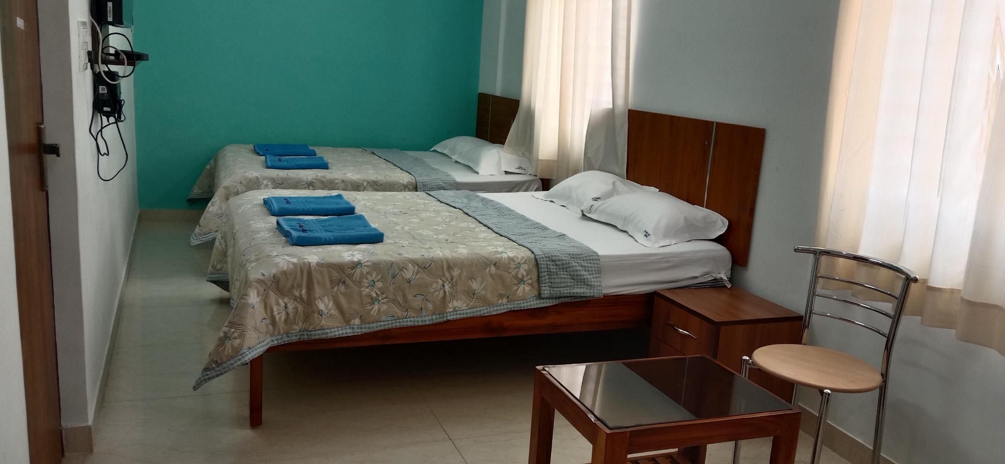 Sri Sai Palace Quadruple Room 2