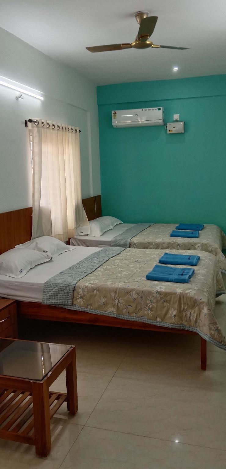 Sri Sai Palace Quadruple Room