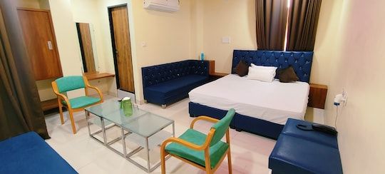 Shri Shiv Ganga Bhakt Niwas Executive Suite Triple AC room with King Bed and Sofa
