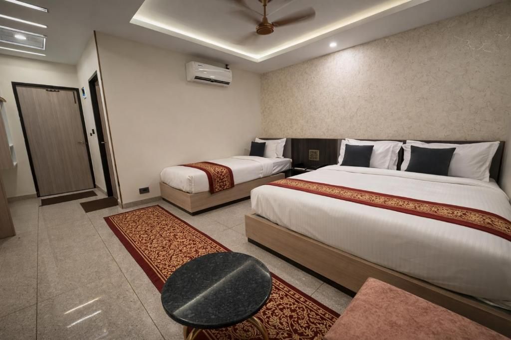 OPO Horizon Surbhi Grant Khatu Shyam Premium Triple Room ( 1 Double Bed  1 Single Bed ) 2
