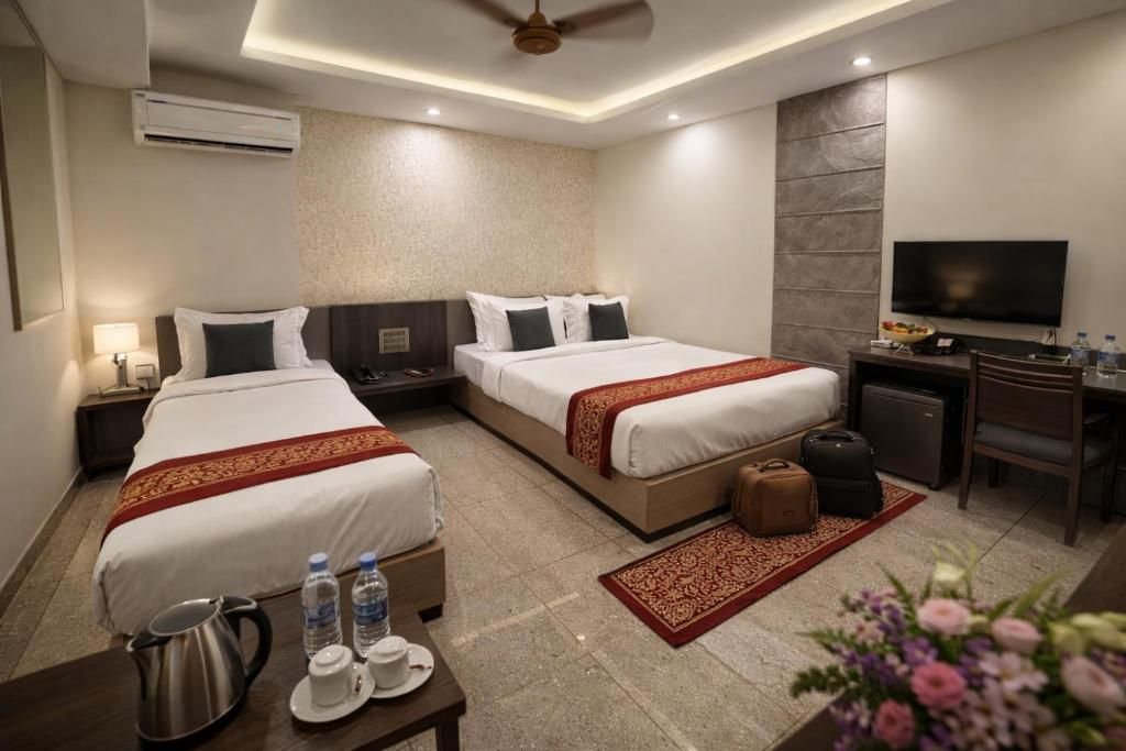 OPO Horizon Surbhi Grant Khatu Shyam Premium Triple Room ( 1 Double Bed  1 Single Bed )