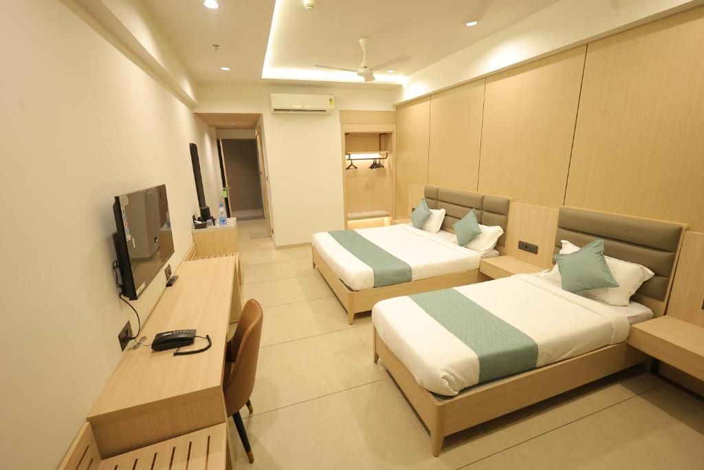 Sarju Palace Deluxe Double Room with Side Sea View 3