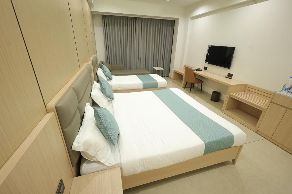 Sarju Palace Deluxe Double Room with Side Sea View