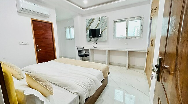 Sai Sansthan Inn Deluxe Room 3