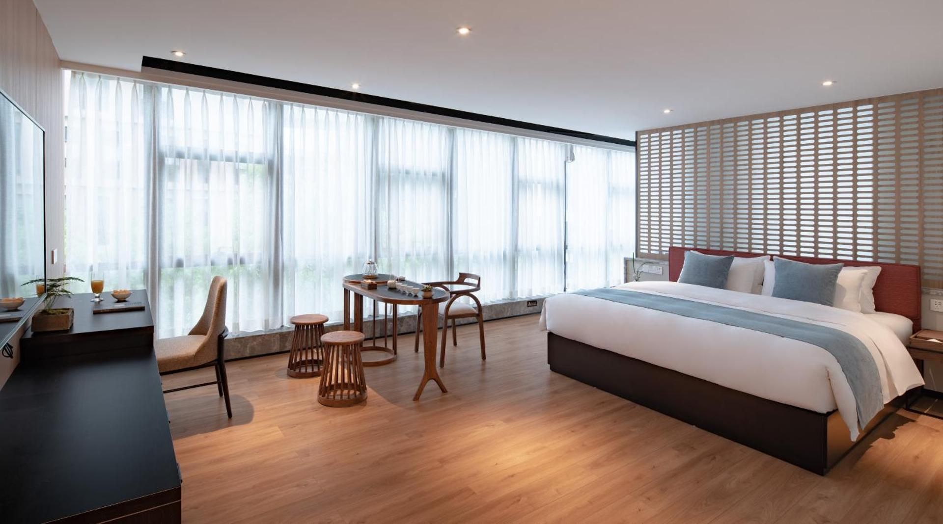 重庆文里苗品茶艺术酒店Chongqing Jiangbei Airport Creative Park Store Deluxe Double Room with Bath 2