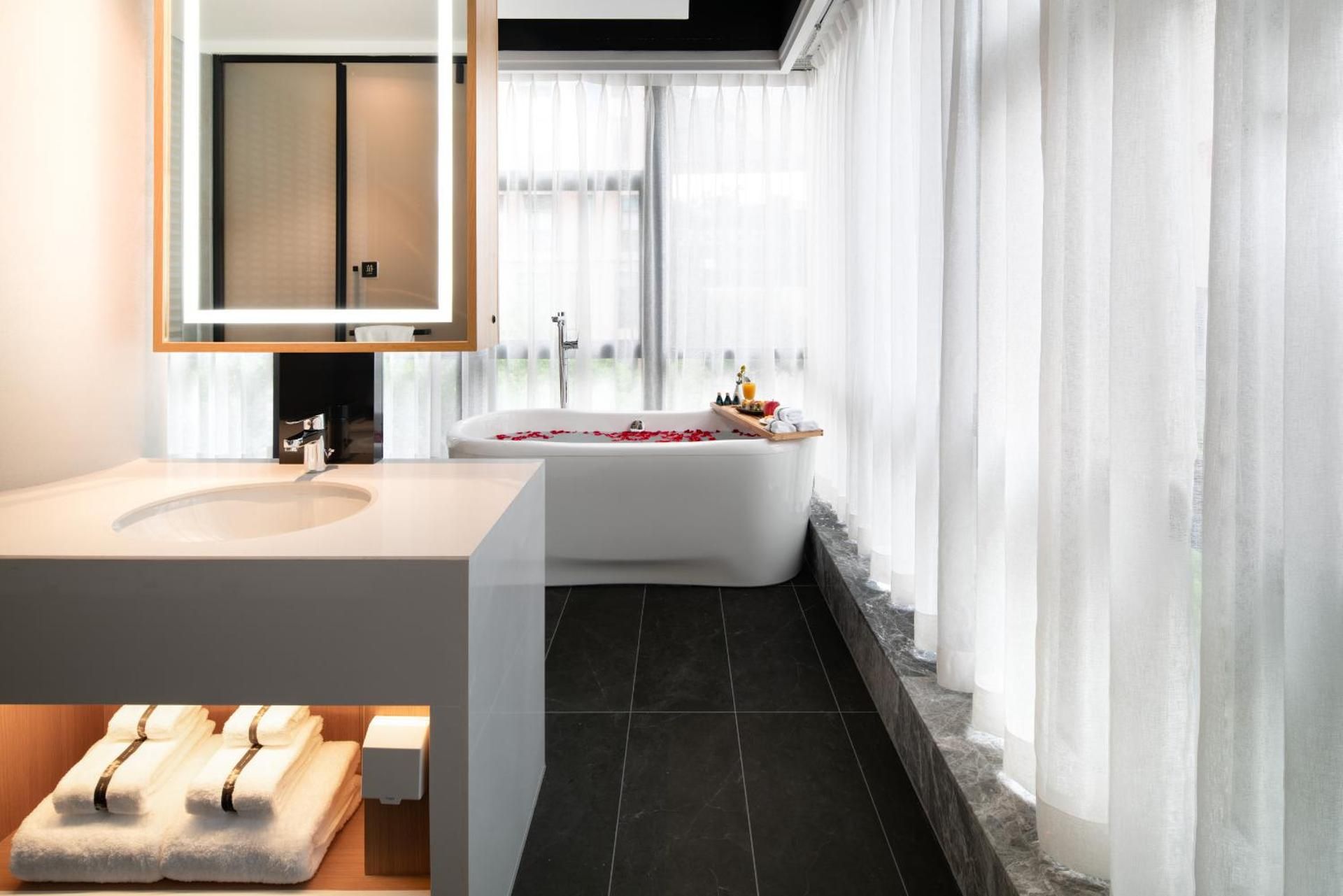 重庆文里苗品茶艺术酒店Chongqing Jiangbei Airport Creative Park Store Deluxe Double Room with Bath 3