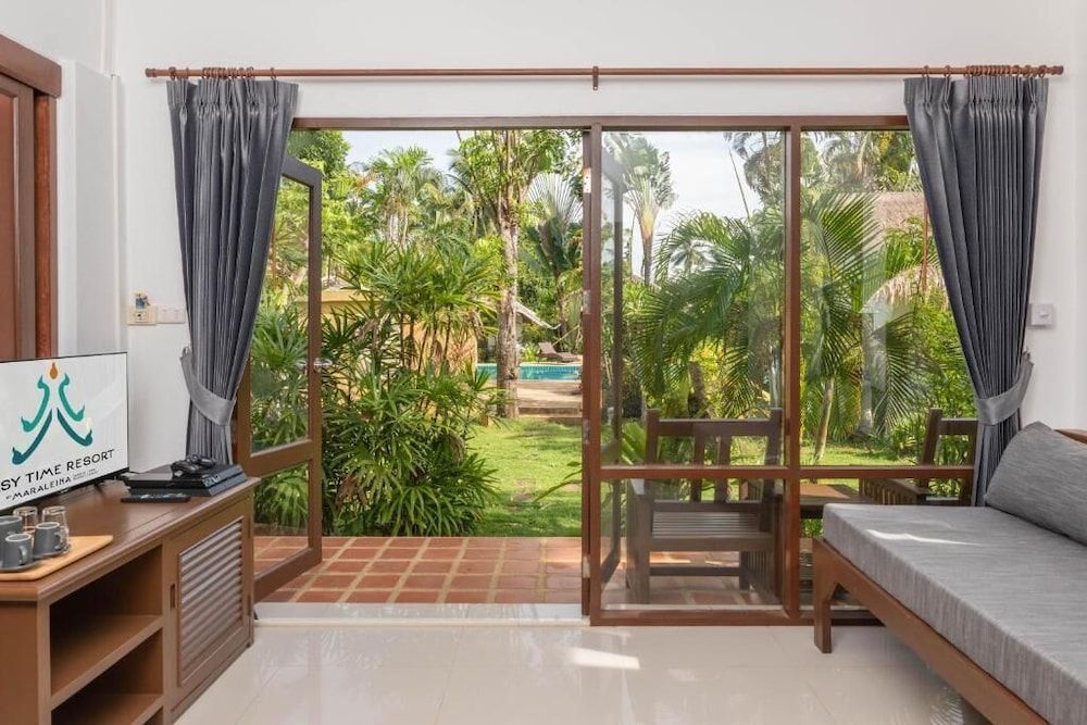 EASY TIME VILLA by MARALEINA Deluxe Villa, 1 Bedroom, Balcony, Garden View 3