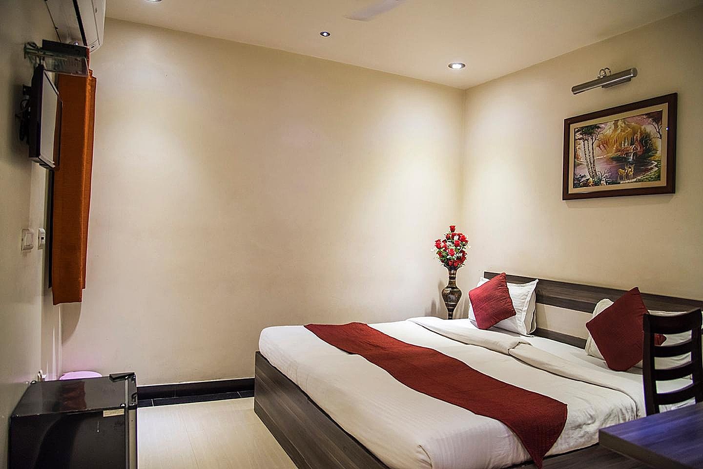 Divine Destination AC Deluxe Room