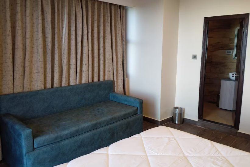 Deluxe Room With Balcony - ( Comes with 1 Sofa Cum Bed Extra )