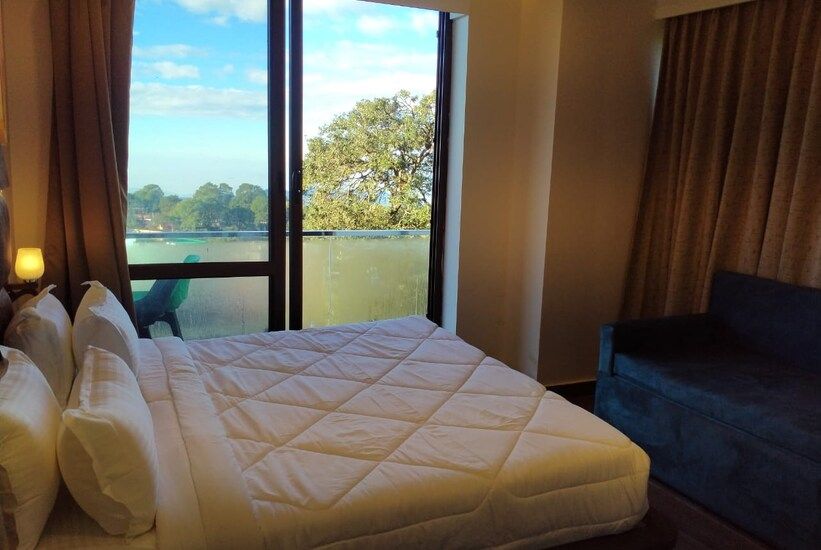 Deluxe Room With Balcony - ( Comes with 1 Sofa Cum Bed Extra )