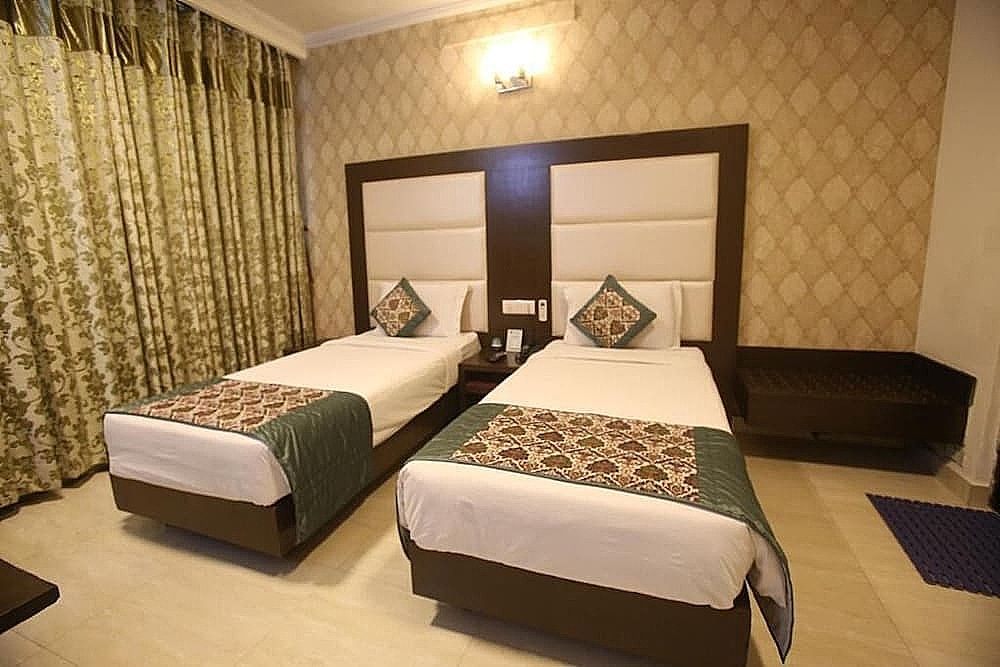 Hotel Amar Inn by Quadis - Lajpat Nagar Deluxe Room 4