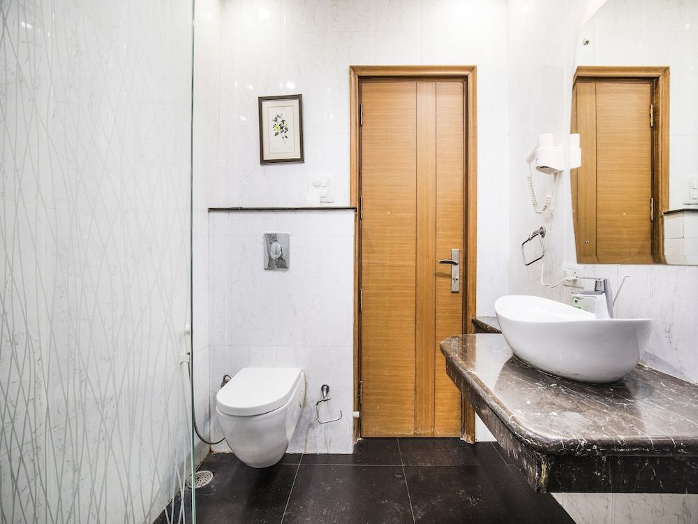 FabHotel GRD DLF Square Deluxe Room 8