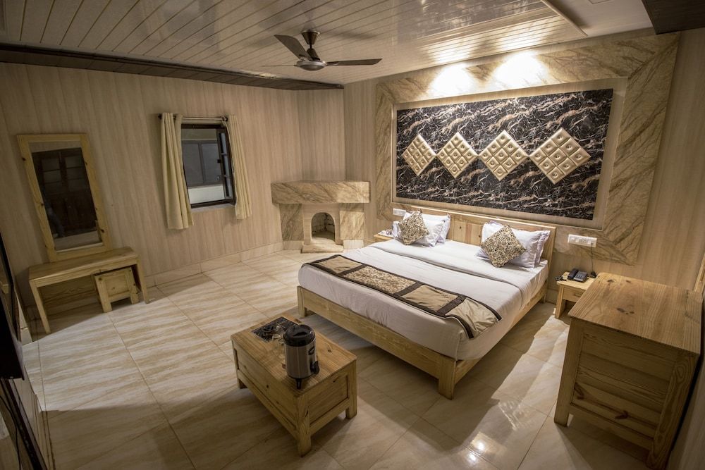 Ark Resorts Deluxe Room 8