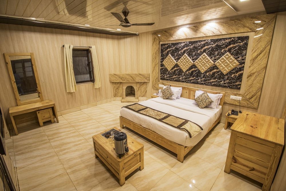 Ark Resorts Deluxe Room 9