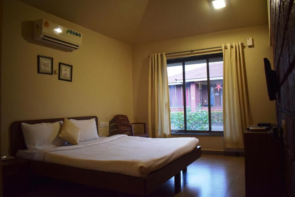 Regenta Resort Mango Village Guhagar Executive Room with Garden View.