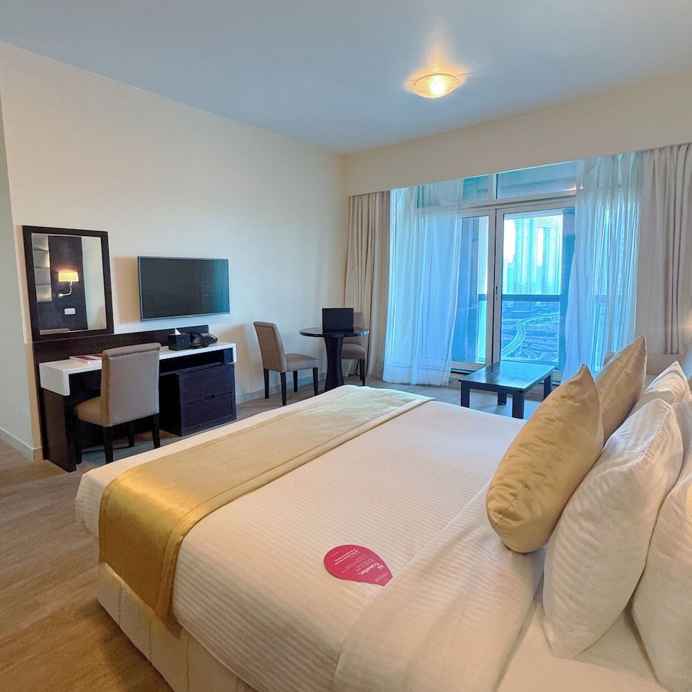 Emirates Grand Hotel Deluxe King Room with Burj Khalifa View 2