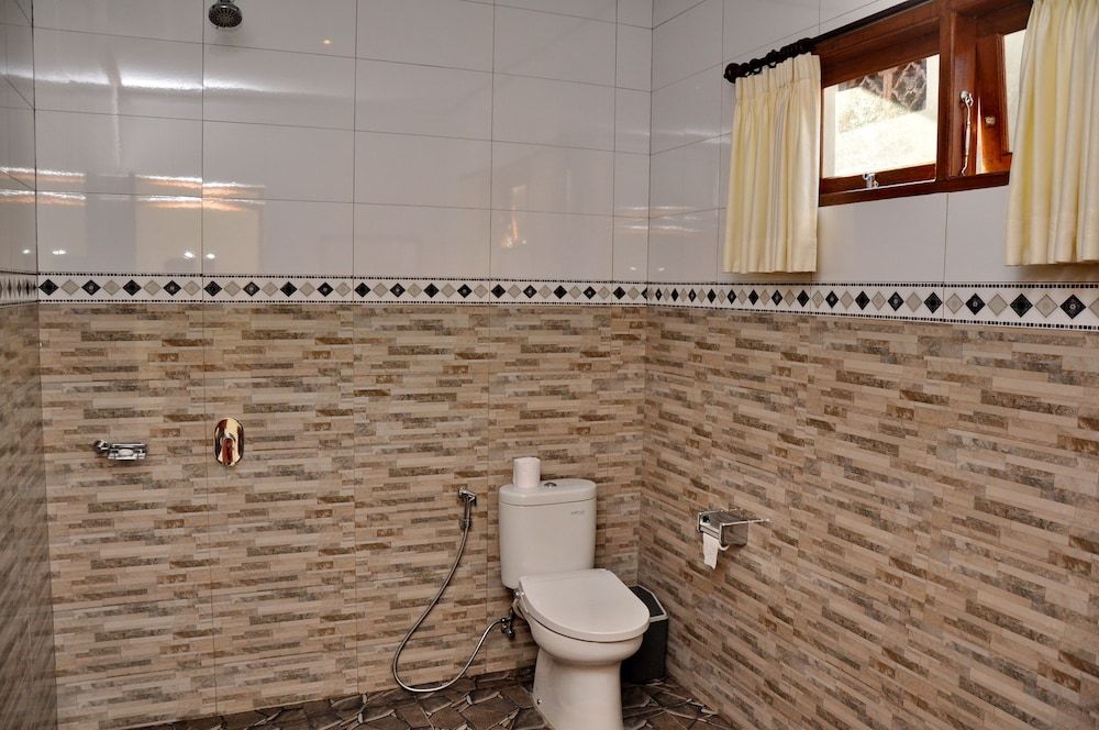 Nick's Homestay Deluxe Twin Room, Garden View 12