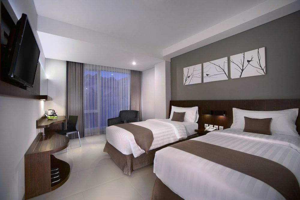 Hotel Neo Denpasar by ASTON Deluxe Room 4